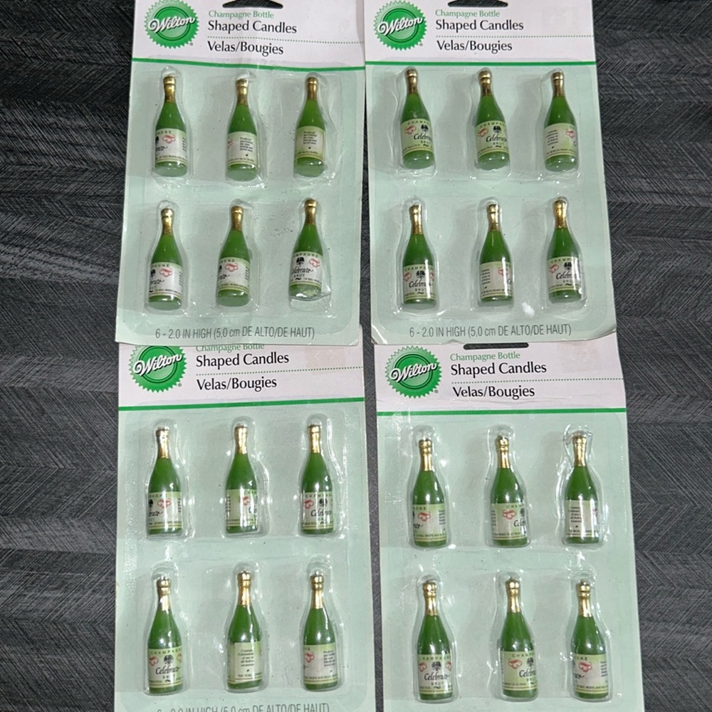 4x Wilton Champagne bottle shaped candles 6 candles each pack